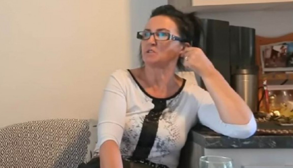 žena