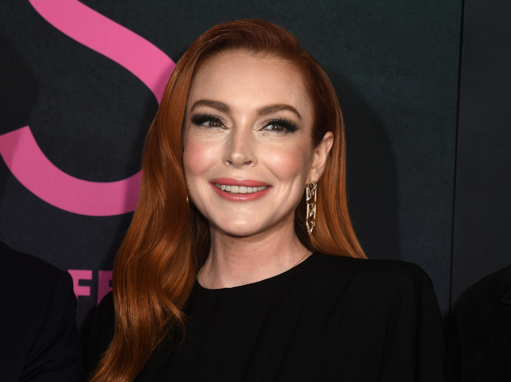 U dugoj haljini sa velikim prorezom privukla sve poglede: Lindzi Lohan se iznenada pojavila na premijeri kultnog filma